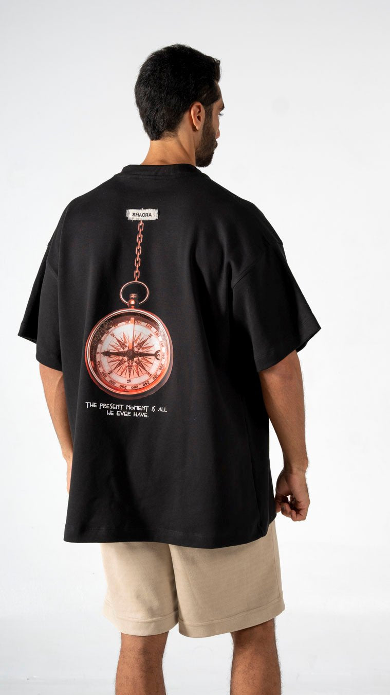Vintage-inspired graphic t-shirt featuring a pocket watch and quote, perfect for casual streetwear fashion. Designed by Shacra, combining modern style with artistic elements.
