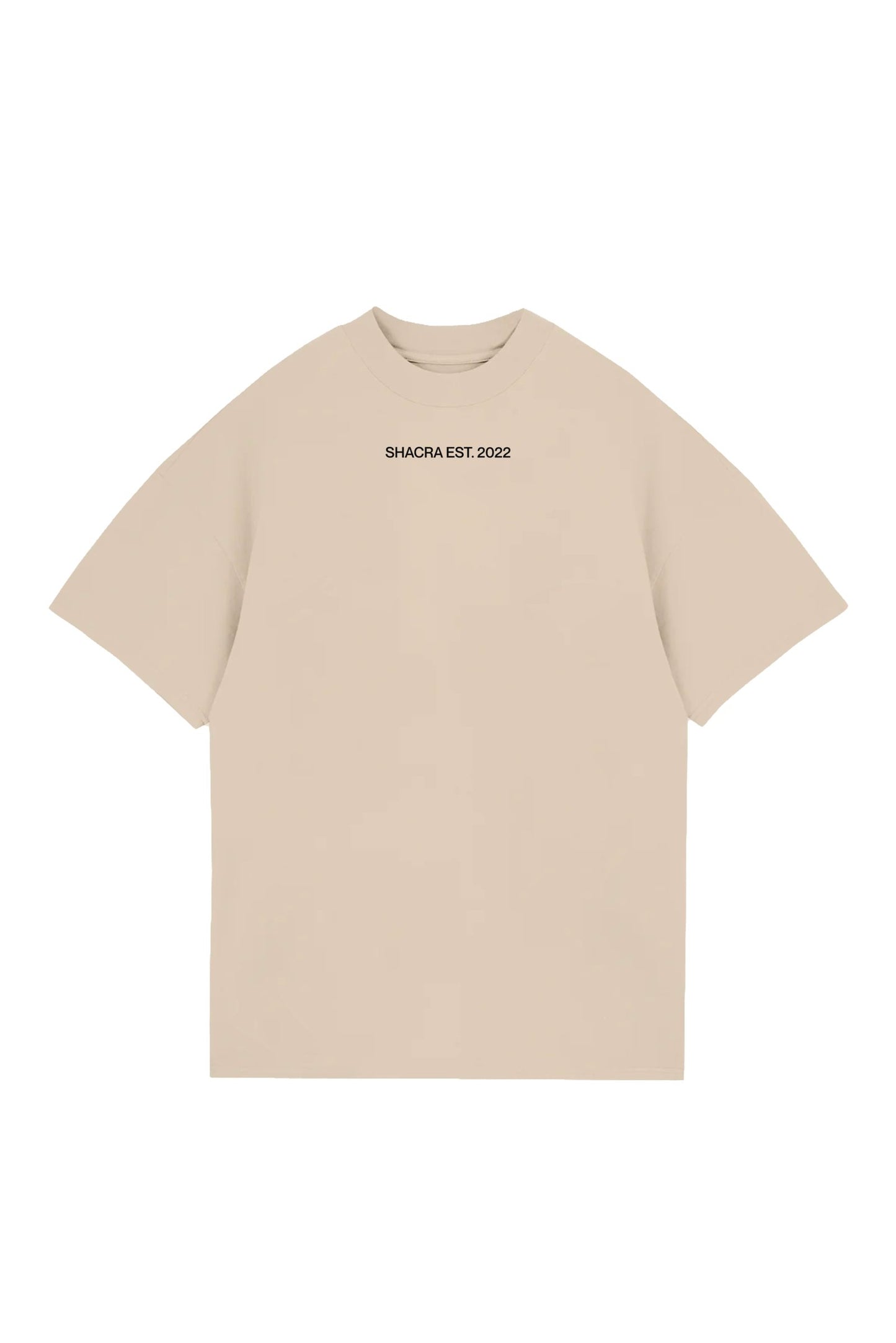 Beige oversized t-shirt with black "SHACRA EST. 2022" text on the chest, casual streetwear design perfect for everyday style.