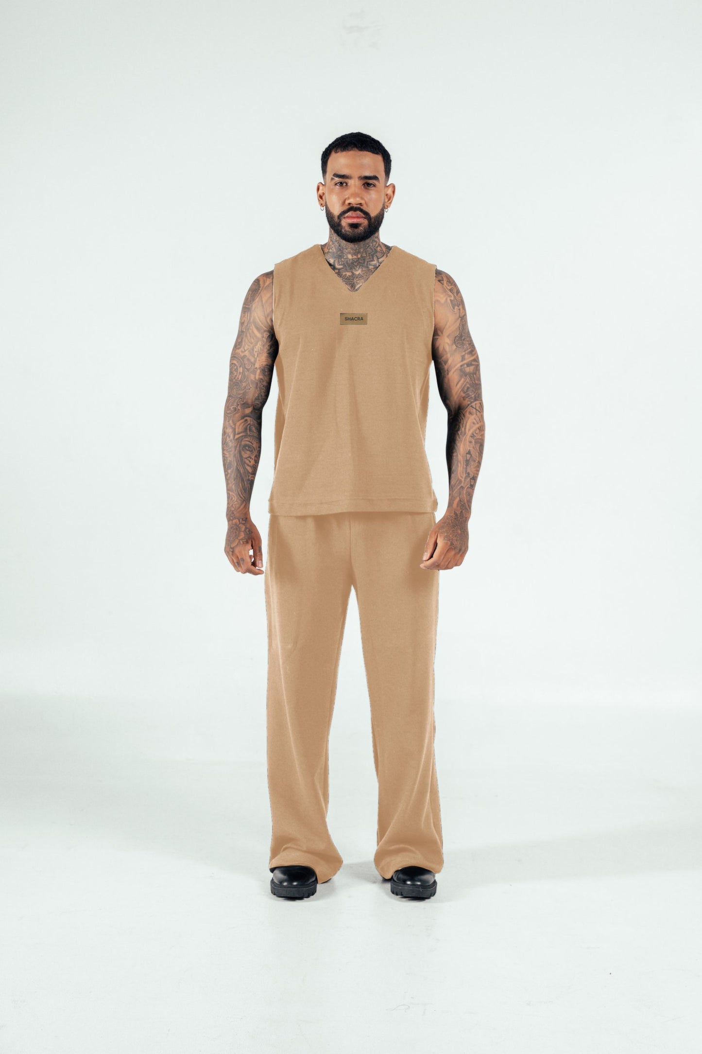 Loose beige tank top and pants outfit for comfortable, stylish fashion by Shacra.