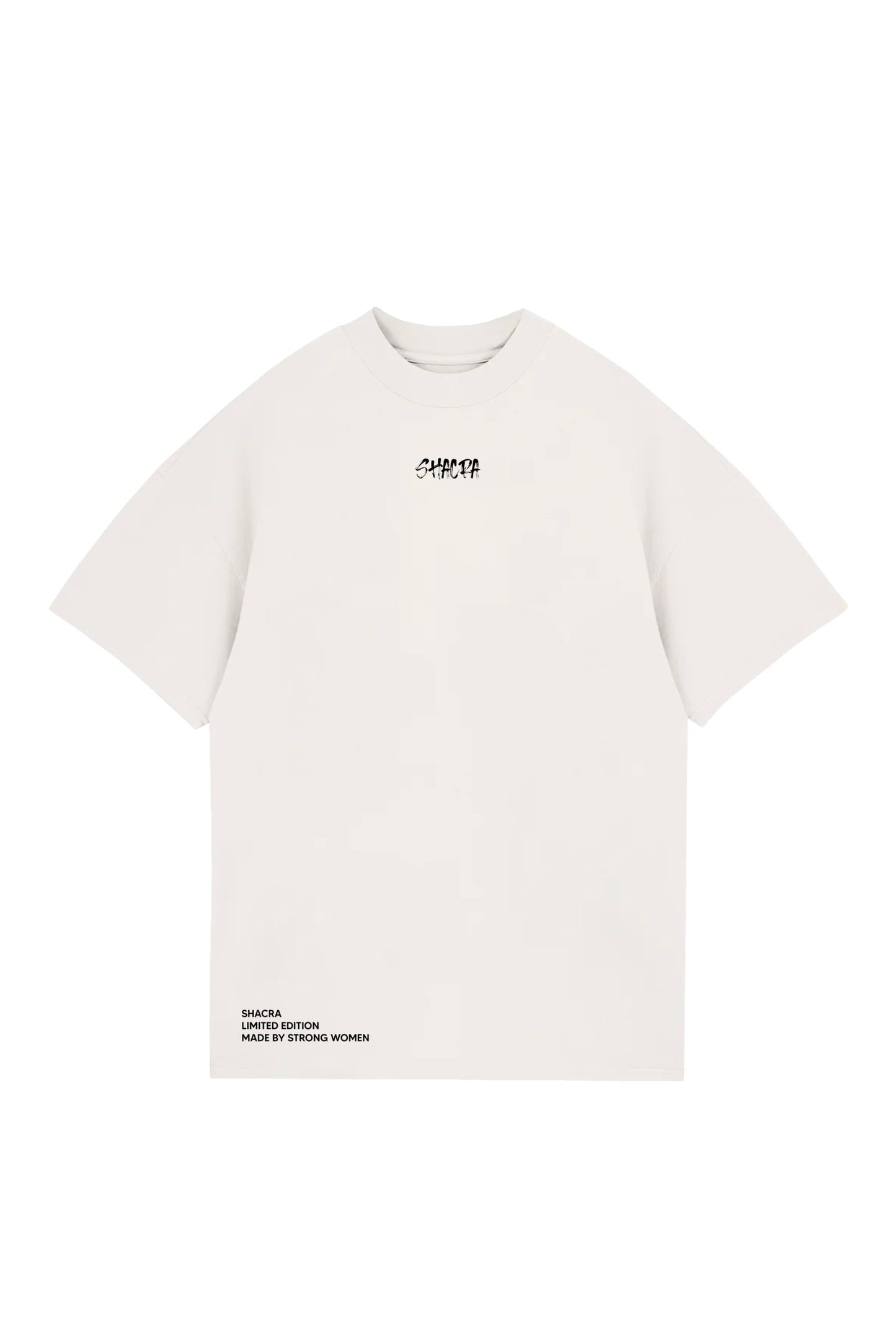 Bold white T-shirt with "SHACRA" logo in black text, oversized fit, made for women, reflecting strength and limited edition style from Shacra.