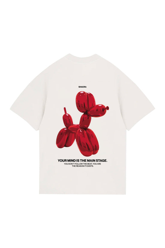 Vibrant red balloon dog graphic on a white T-shirt, featuring the brand name "Shacra" and an inspiring motivational quote, perfect for modern streetwear and artistic fashion statements.