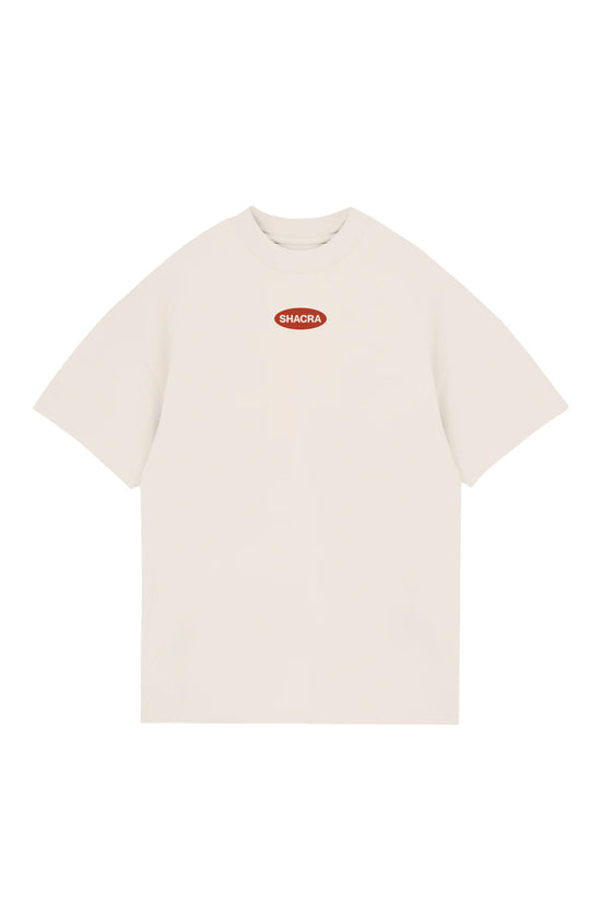 Vintage white T-shirt with red "SHACRA" logo, casual streetwear, minimalist design, unisex fit, perfect for everyday styling.