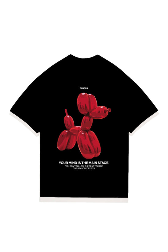 Balloon dog graphic T-shirt with motivational quote in bold black and red design.