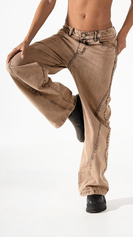Comfy wide-leg brown jeans with black boots for casual fashion styling.