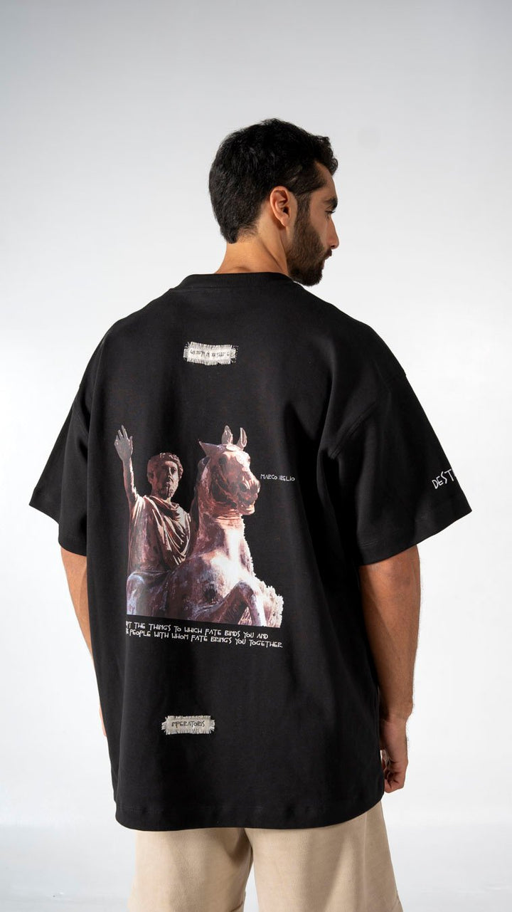 Unique black graphic T-shirt featuring artistic sculpture design and philosophical text, perfect for contemporary streetwear fashion enthusiasts.