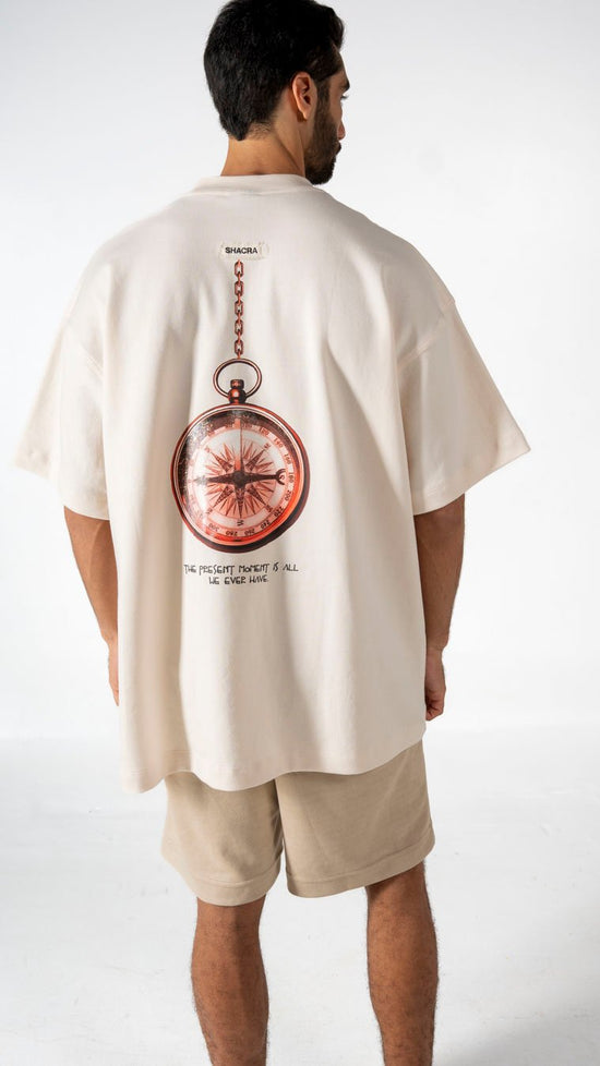 Time capsule graphic t-shirt with compass print and motivational quote, men's casual fashion, trendy streetwear design, summer outfit inspiration, Shacra, modern graphic tee for men.
