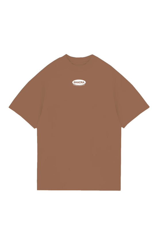 Organic brown T-shirt featuring the Shacra logo with the tagline "Your Mind Is The Main Store" for streetwear fashion enthusiasts. Perfect for casual style and promoting mindfulness.