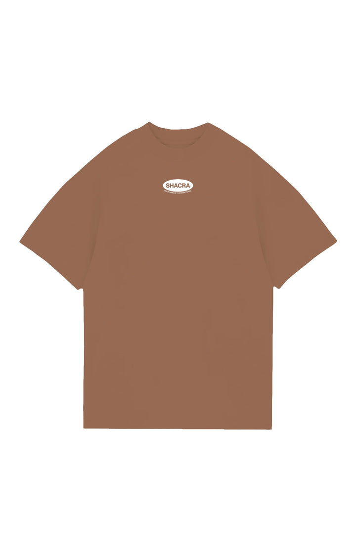 Organic brown T-shirt featuring the Shacra logo with the tagline "Your Mind Is The Main Store" for streetwear fashion enthusiasts. Perfect for casual style and promoting mindfulness.