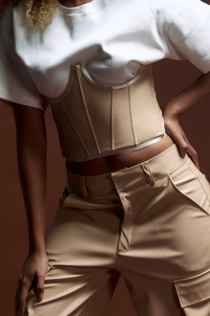 Corset, beige waist cincher, shaping garment, fashion accessories, women's waist trainer, Shacra fashion, modern styling, elegant outfit, body shaping clothing, minimalist fashion.