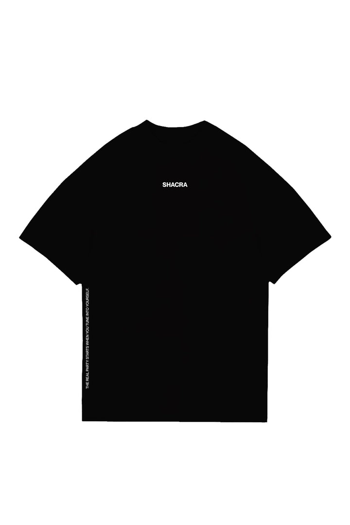 Elegant black T-shirt featuring minimalist white "SHACRA" text on the chest and inspiring quote along the sleeve, perfect for modern streetwear and fashion statements.