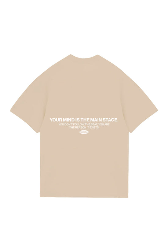 Inspirational beige t-shirt with motivational quote about the power of the mind, perfect for fashion-forward individuals who appreciate meaningful statements and stylish designs.