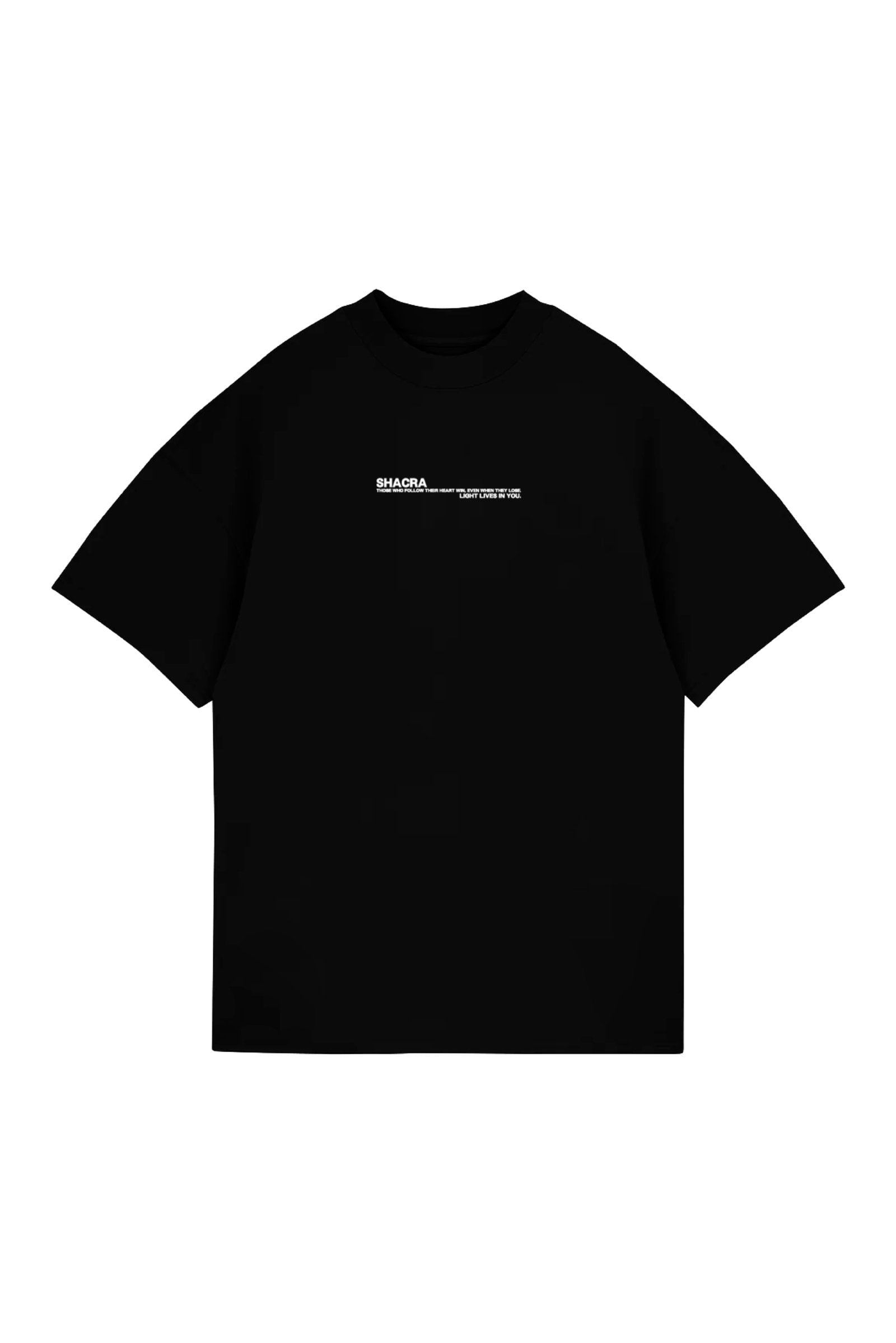 Black graphic t-shirt with white text design, inspired by Shacra fashion, featuring motivational message in minimalistic style. Perfect for streetwear and casual outfits.