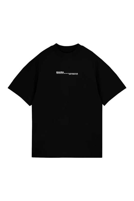 Black graphic t-shirt with white text design, inspired by Shacra fashion, featuring motivational message in minimalistic style. Perfect for streetwear and casual outfits.