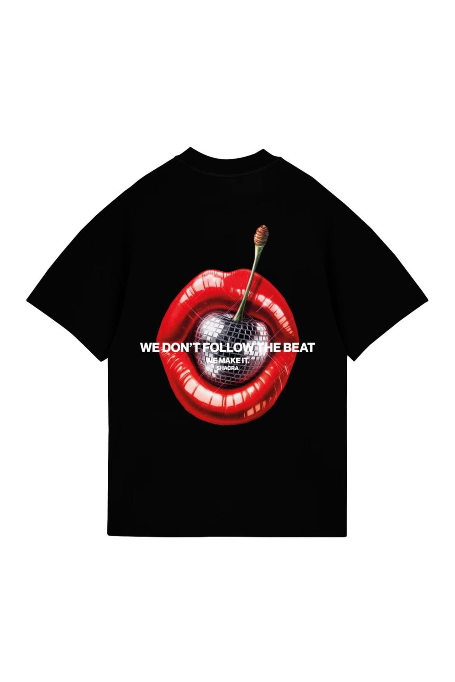 Vivid black T-shirt featuring a bold graphic of red lips with a cherry inside and a disco ball, emblazoned with the phrase "We don't follow the beat, we make it" for a statement-making fashion statement.