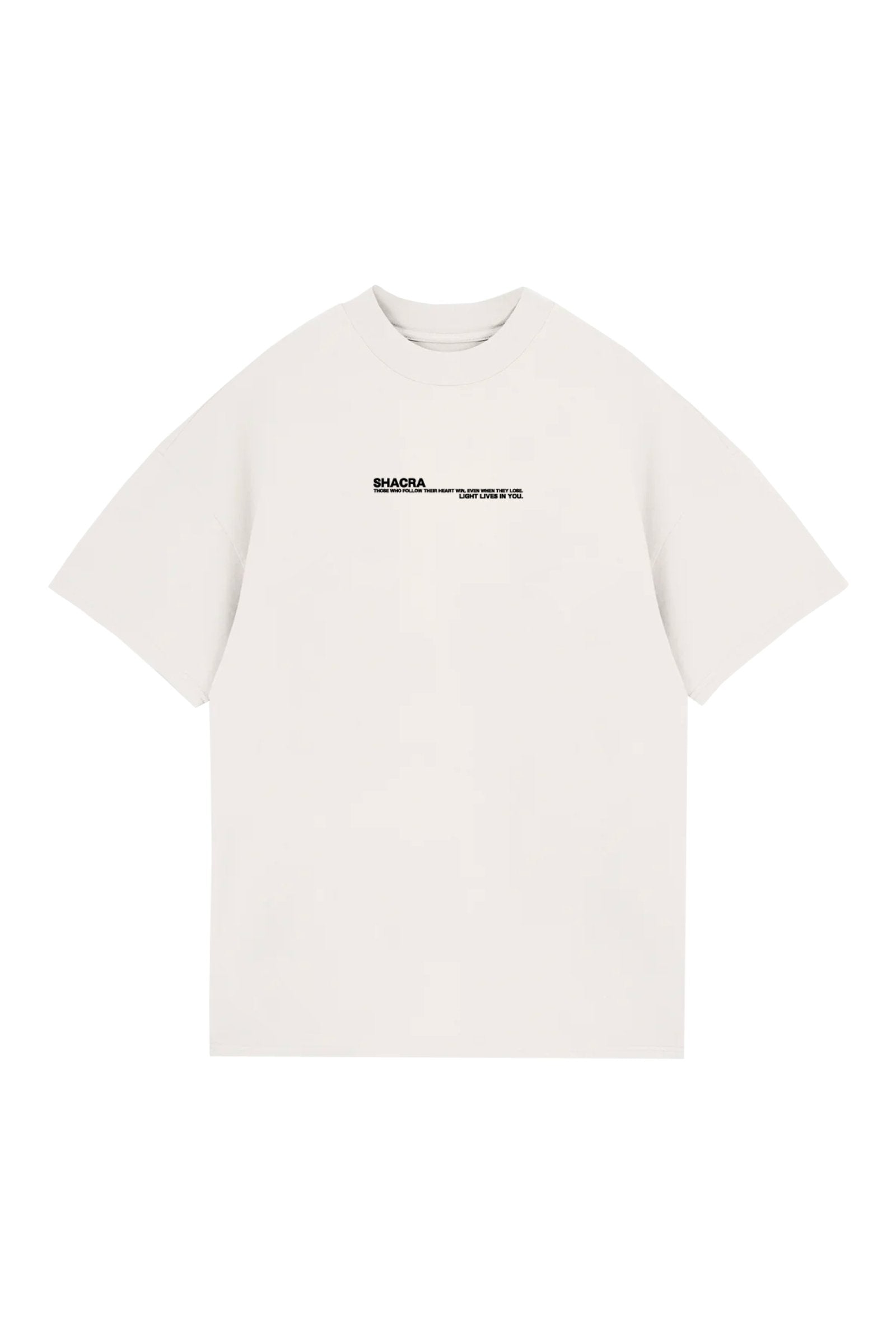 Minimalist white T-shirt featuring black "Shacra" logo and inspirational quote, perfect for casual wear and street style. Designed for comfort and style, showcasing unique branding.