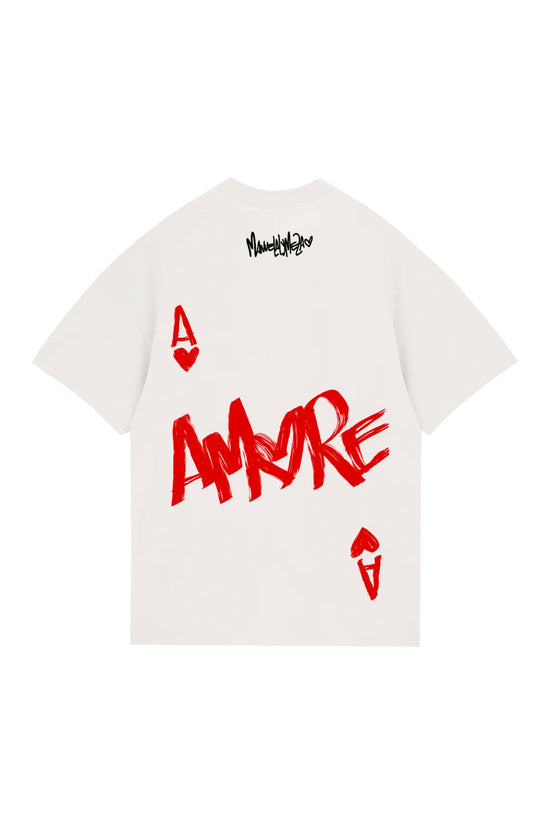 Bright white t-shirt featuring bold red graffiti-style "Amore" text and heart accents, with black signature detail on the back neck, perfect for streetwear and youthful fashion statements.